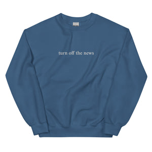 Turn Off The News Embroidered Crew